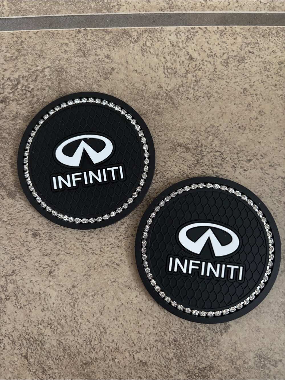 Two pack of Bedazzled Infiniti Silicone Car Coasters